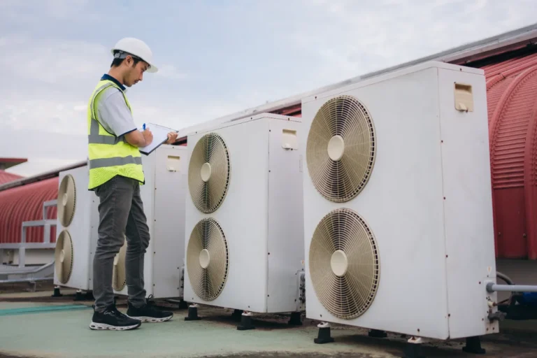 A man checking for the maintenance of the HVAC performance.