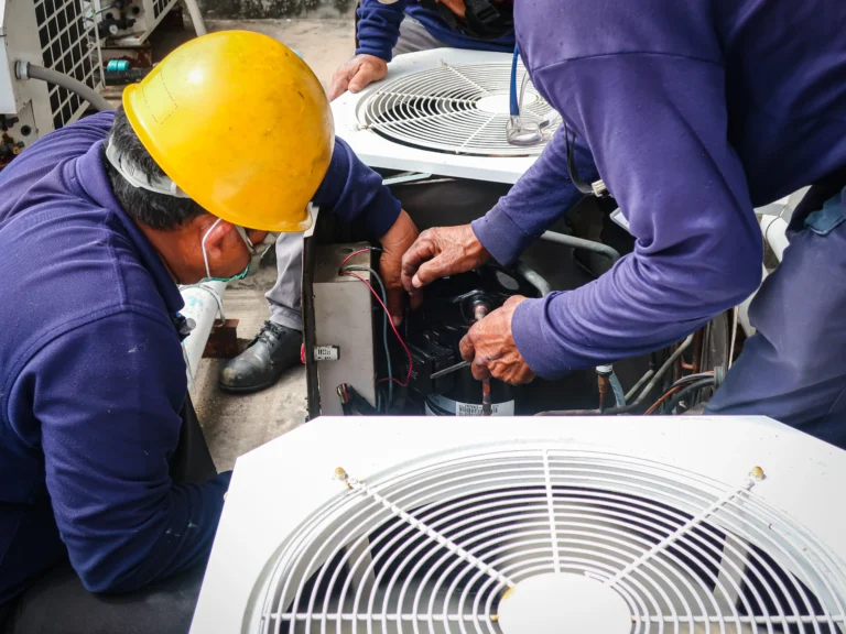 Workers repairing the HVAC problem.